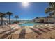 Enjoy a sun-soaked day at this beautiful community pool overlooking tranquil waters and boasting ample seating at 8866 Tuscany Isles Dr, Punta Gorda, FL 33950