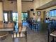 Clubhouse interior featuring a bar, seating area, and open layout, perfect for gatherings and socializing at 96 Vivante Blvd # 9622, Punta Gorda, FL 33950