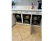 This kitchen features roll out cabinet shelves for organized convenient storage of kitchenware at 96 Vivante Blvd # 9622, Punta Gorda, FL 33950