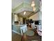 Bright kitchen boasts white cabinets, countertops, and modern appliances at 96 Vivante Blvd # 9622, Punta Gorda, FL 33950
