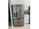 Modern kitchen featuring a stainless steel, large capacity refrigerator with water and ice dispenser at 96 Vivante Blvd # 9622, Punta Gorda, FL 33950