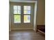 Bright room featuring two windows, neutral walls, and modern flooring at 96 Vivante Blvd # 9622, Punta Gorda, FL 33950