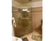 Walk-in shower with glass door and bench seating offers modern convenience at 96 Vivante Blvd # 9622, Punta Gorda, FL 33950