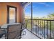 Relaxing balcony with seating, providing scenic views of lush landscaping and the community at 99 Vivante Blvd # 310, Punta Gorda, FL 33950