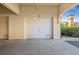 Spacious one car garage with concrete floor and an automatic door at 99 Vivante Blvd # 310, Punta Gorda, FL 33950