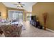 Inviting living room features comfortable seating, neutral decor, and sliding glass doors to outdoor living area at 99 Vivante Blvd # 310, Punta Gorda, FL 33950