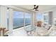 Bright living room featuring a bay view, light tile flooring and neutral tones at 1 Colony Point Dr # B20, Punta Gorda, FL 33950