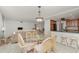 Open concept floor plan featuring a dining area and living room with great natural lighting at 1 Colony Point Dr # B20, Punta Gorda, FL 33950