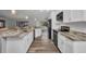 Spacious kitchen featuring granite countertops and stainless steel appliances at 1210 Mccrory St, North Port, FL 34286