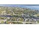 Aerial view featuring waterfront properties, canals and landscaping at 12299 Albrecht Ter, Port Charlotte, FL 33981