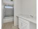 Bathroom with new tub, shower, white sink and countertop at 12299 Albrecht Ter, Port Charlotte, FL 33981