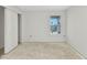 Bright bedroom with a sliding door and a window at 12299 Albrecht Ter, Port Charlotte, FL 33981