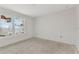 Bedroom featuring large window bringing ample natural light at 12299 Albrecht Ter, Port Charlotte, FL 33981