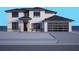 Modern exterior showcasing a gray roof, white siding and stone accents at 12299 Albrecht Ter, Port Charlotte, FL 33981
