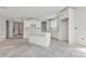 Spacious kitchen features a large island, bright cabinets, and modern design elements at 12299 Albrecht Ter, Port Charlotte, FL 33981