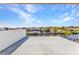 Waterfront view with a peek of a neighboring house on a sunny day at 12299 Albrecht Ter, Port Charlotte, FL 33981
