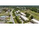 Aerial view of condos with community pool and golf course views at 1236 Rio De Janeiro Ave # 406, Punta Gorda, FL 33983