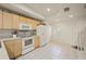 Inviting kitchen with tile floor, ample counter space, and modern white appliances for easy cooking at 1236 Rio De Janeiro Ave # 406, Punta Gorda, FL 33983