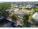 An aerial view of the property including the pool, dock and backyard at 125 Small Se St, Port Charlotte, FL 33952