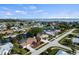 Aerial view of the home and neighborhood in a waterfront community at 125 Small Se St, Port Charlotte, FL 33952