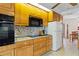 Well-equipped kitchen with granite countertops, stainless steel appliances, and ample cabinet space at 125 Small Se St, Port Charlotte, FL 33952