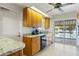 Spacious kitchen featuring stainless steel appliances, granite countertops, and pool view at 125 Small Se St, Port Charlotte, FL 33952