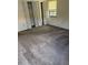 Bedroom with carpet and bi-fold doors at 1318 San Mateo Dr, Punta Gorda, FL 33950