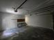 Spacious garage with workbench and storage options provides ample space for vehicles and projects at 1318 San Mateo Dr, Punta Gorda, FL 33950