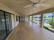 Large screened patio featuring ceiling fans and stunning waterfront views, perfect for outdoor relaxation and enjoyment at 1318 San Mateo Dr, Punta Gorda, FL 33950