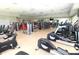 Fitness center featuring state-of-the-art exercise equipment with hardwood floors at 13256 Creekside Ln, Port Charlotte, FL 33953
