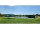 Community tennis court available for year-round play, featuring a covered seating area for spectators and players at 13256 Creekside Ln, Port Charlotte, FL 33953