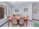 Dining room featuring a wood dining set and decorations on the wall at 13295 Eisenhower Dr, Port Charlotte, FL 33953