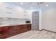 Bright kitchen features white cabinets, wood drawers, and stainless steel microwave at 13295 Eisenhower Dr, Port Charlotte, FL 33953