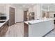 Modern kitchen featuring an island, sleek cabinetry, and stainless steel appliances at 13295 Eisenhower Dr, Port Charlotte, FL 33953