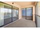 Screened-in porch featuring scenic waterfront views and access to the living room with sliding glass doors at 1348 Rock Dove Ct # C201, Punta Gorda, FL 33950