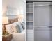 View of a bedroom with closet, shelves, hanging rod, and decor at 14350 Marlin Ave, Port Charlotte, FL 33953