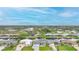Expansive aerial shot showcasing waterfront homes connected by canals at 15148 Taurus Cir, Port Charlotte, FL 33981