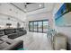 Open-concept living room with a view of the pool area, connecting indoor and outdoor spaces at 15148 Taurus Cir, Port Charlotte, FL 33981