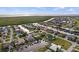 Aerial view of waterfront homes showcasing a picturesque community surrounded by canals and lush greenery at 1932 Los Alamos Dr, Punta Gorda, FL 33950