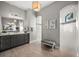 Stylish bathroom features a double vanity, tiled walk-in shower, and elegant fixtures for a spa-like experience at 1932 Los Alamos Dr, Punta Gorda, FL 33950