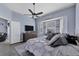 Serene main bedroom featuring a comfortable bed, dresser, and large window at 2028 Lynx Run, North Port, FL 34288