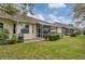 Exterior view of two screened-in patios at the rear of the home at 2028 Lynx Run, North Port, FL 34288