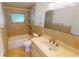 Bright bathroom featuring a tiled shower-tub, and vanity with a countertop sink at 2028 River Basin Ter, Punta Gorda, FL 33982