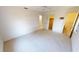 Bedroom with neutral carpet, walk in closet and ensuite bathroom at 2028 River Basin Ter, Punta Gorda, FL 33982