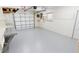Spacious garage with painted floors, peg board and work bench at 2028 River Basin Ter, Punta Gorda, FL 33982
