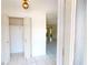 Bright hallway with tiled floors, closet and views into other rooms at 2028 River Basin Ter, Punta Gorda, FL 33982