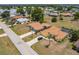 Aerial view of two homes with well manicured lawns with proximity to a lake at 2365 Nuremberg Blvd, Punta Gorda, FL 33983