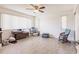 Spacious bedroom with natural light, ceiling fan, and light colored wood flooring at 2365 Nuremberg Blvd, Punta Gorda, FL 33983