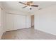 Clean bedroom with wood-look flooring, bright white walls and a closet at 2365 Nuremberg Blvd, Punta Gorda, FL 33983