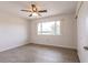 Bedroom showing a large window, bright white walls and wood-look flooring at 2365 Nuremberg Blvd, Punta Gorda, FL 33983